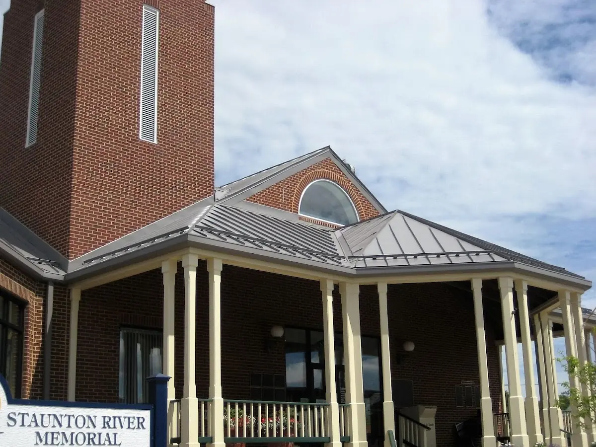 Skilled roofing craftsmen working on a residential roof in Penn View